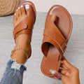 Women's flat heel leisure slippers in solid colour artificial PU with metal and leather stitching, sizes 36-43