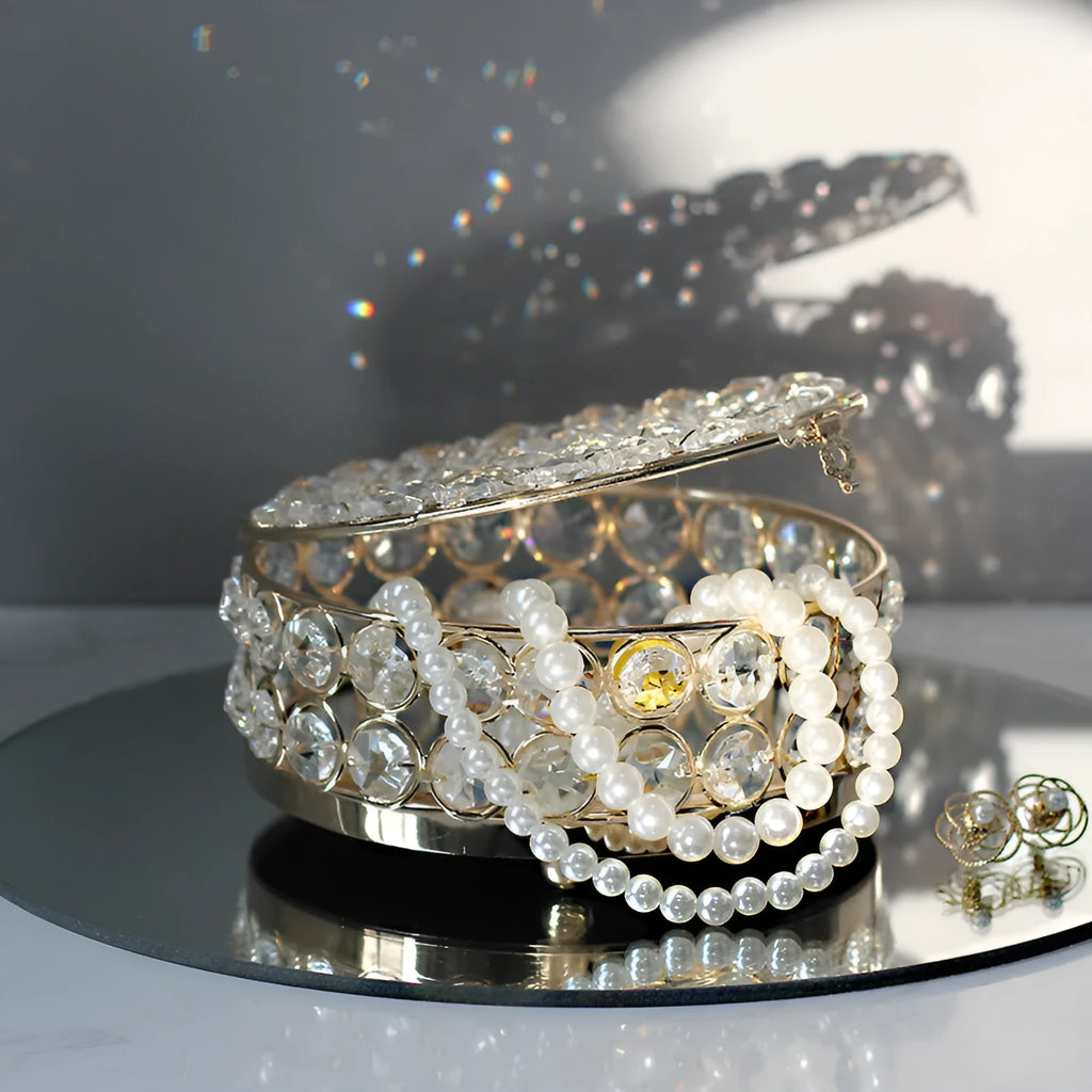 Crystal glass jewelry storage box with transparent sides and French gold metal frame
