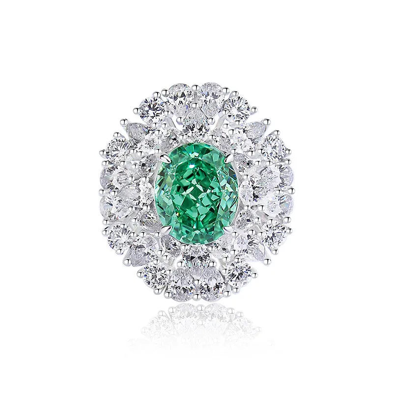 S925 sterling silver women's ring with ellipse emerald and inlaid high carbon diamond in geometric setting.