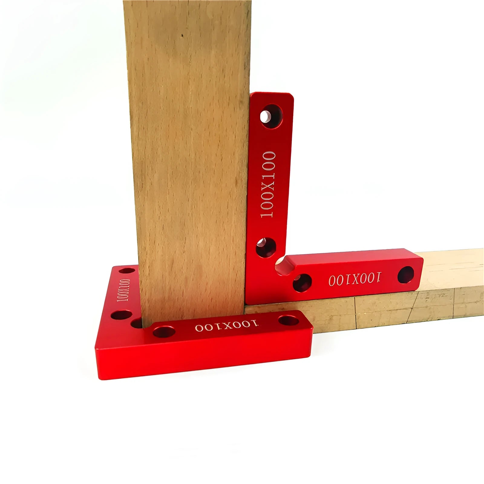 Machined aluminium right angle positioning block for woodworking jigs, showing 90-degree internal corner and scale.