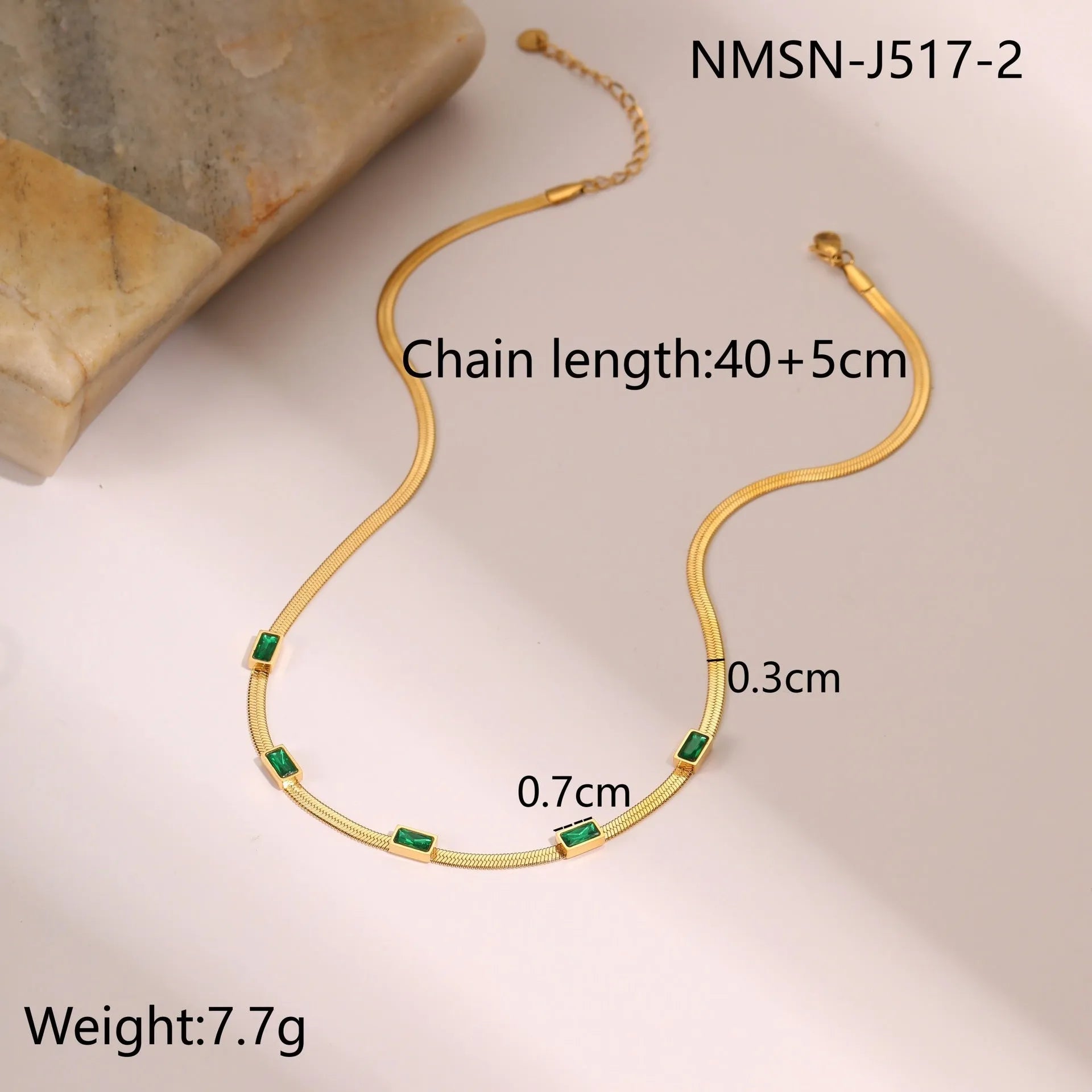 Geometric square zircon pendant on a flat stainless steel snake chain necklace in gold or steel colour.