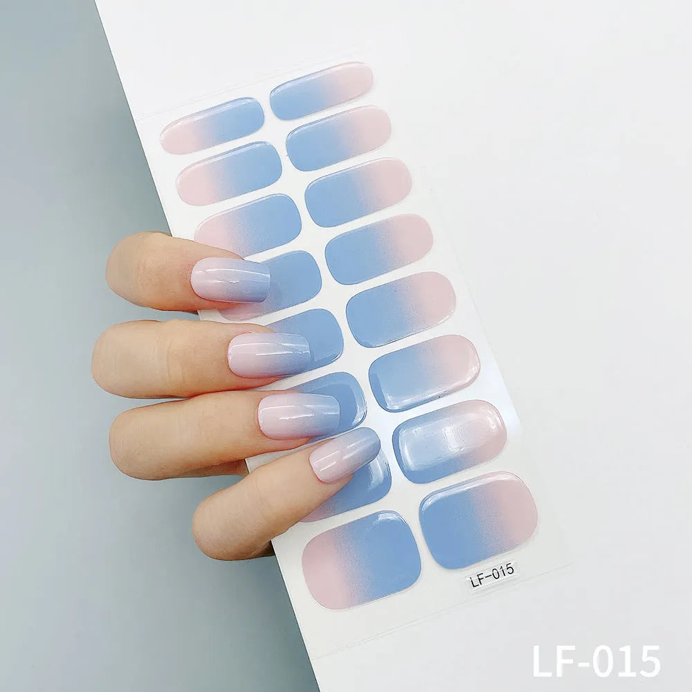 16 solid colour full nail art stickers with 22 patterns including cross, rose, butterfly designs in 12x6mm oval size