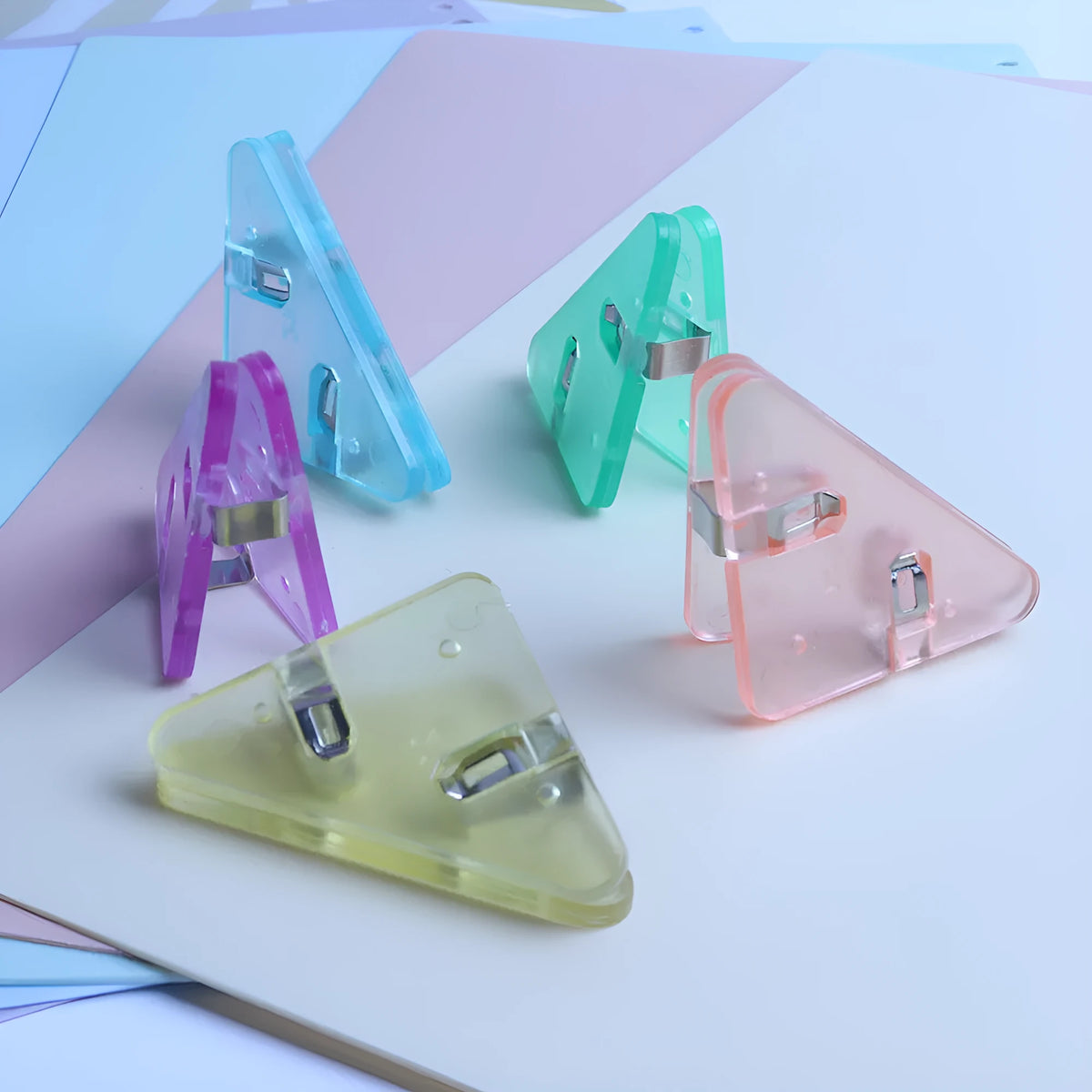 Plastic corner clip for student file storage in ice crystal yellow or smoothie blue