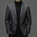 Men's black lapel-style thickened down jacket with side seam pockets on a mannequin.