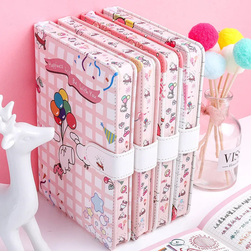 Small white notebook with magnetic buckle showing Kaba Bear Hippo design on PU leather cover