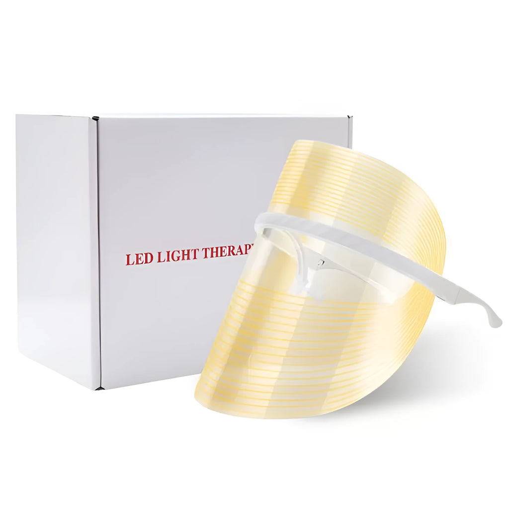 Transparent ABS LED light therapy face mask with red, yellow, and blue lights for home skin care