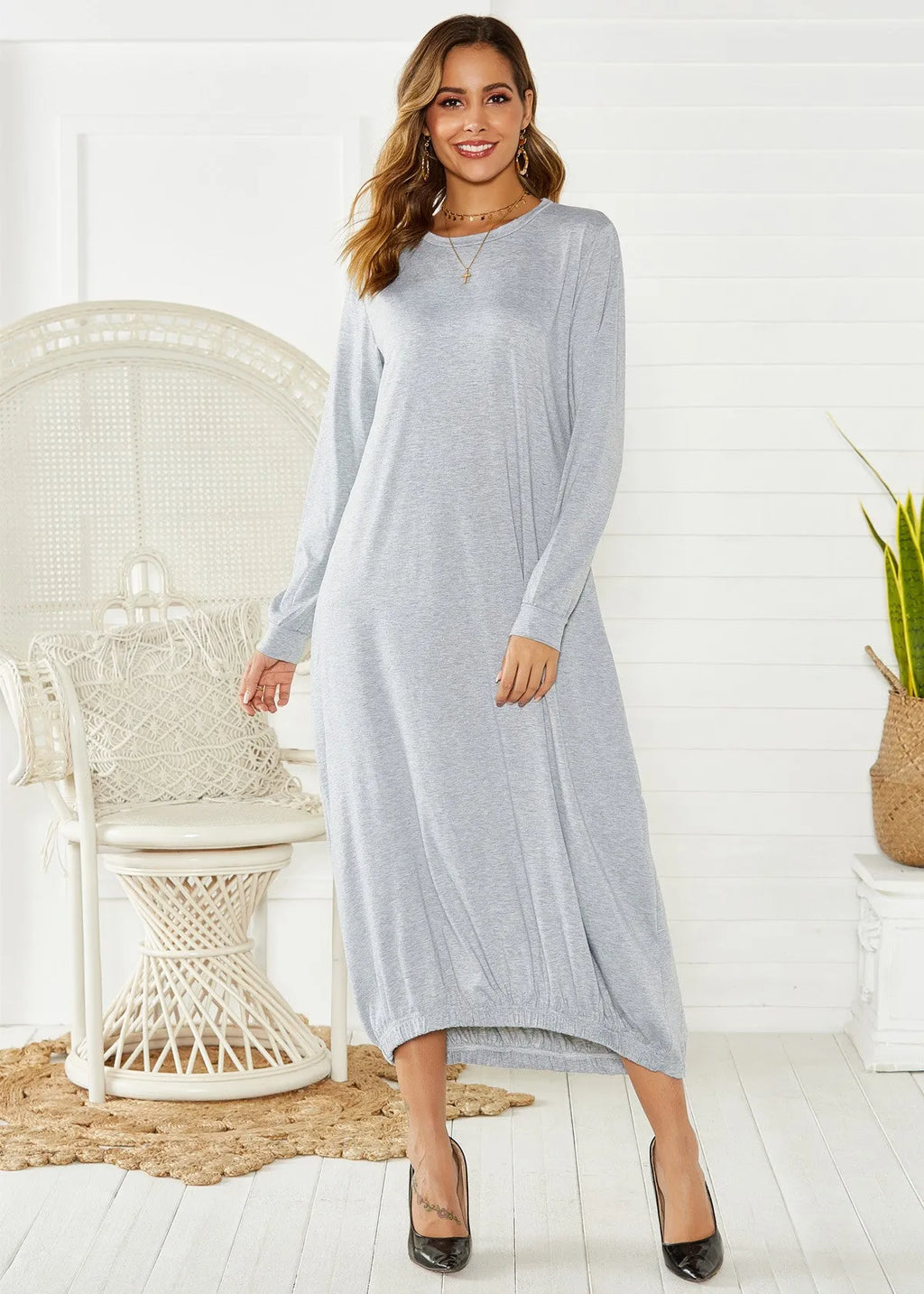Women's black loose long lantern dress with lace-up crew neck, knitted polyester casual wear.