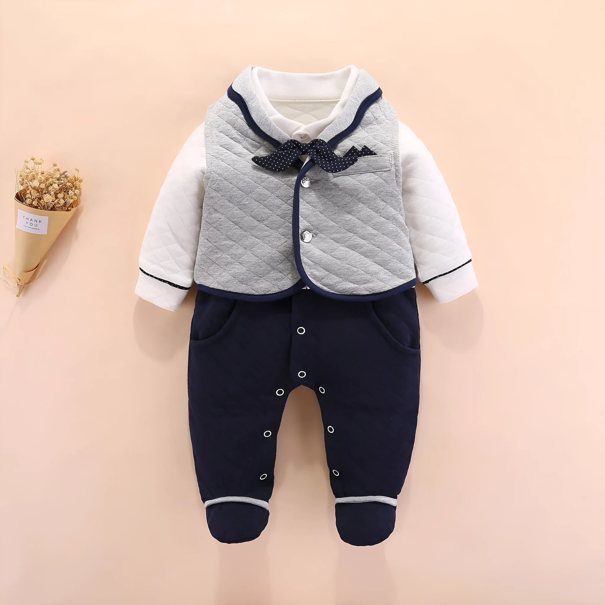 Baby boy British-style cotton onesie in navy blue with long sleeves and single-breasted front
