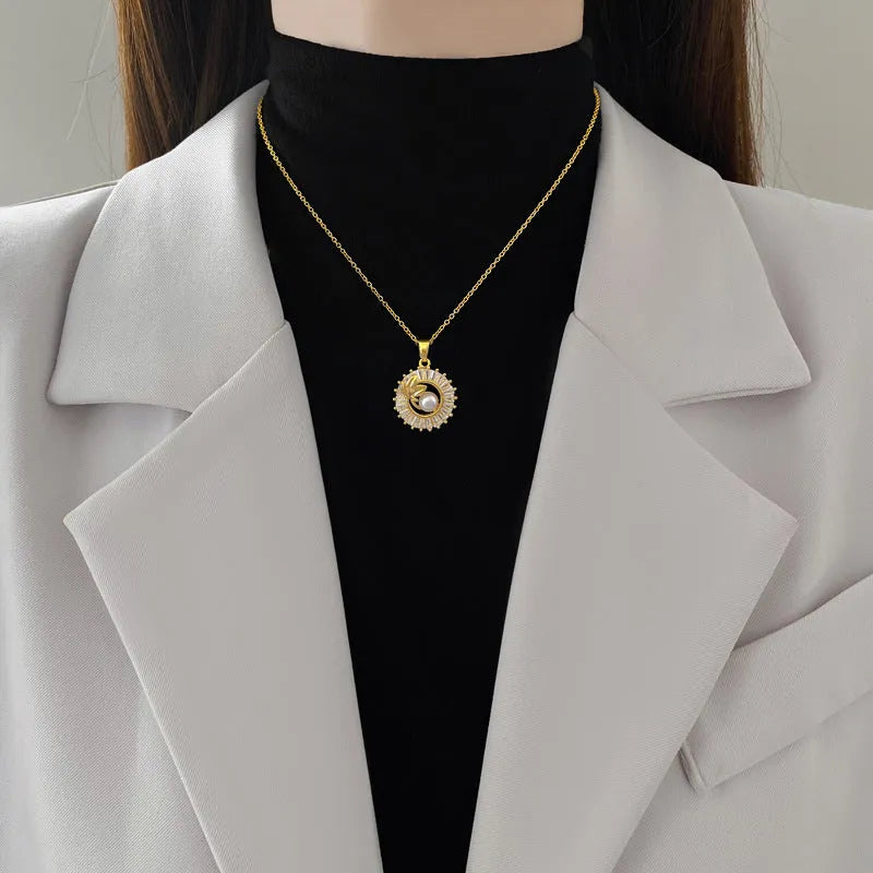 Women's titanium steel necklace and earrings set with square diamond ring pendant and leaf design.