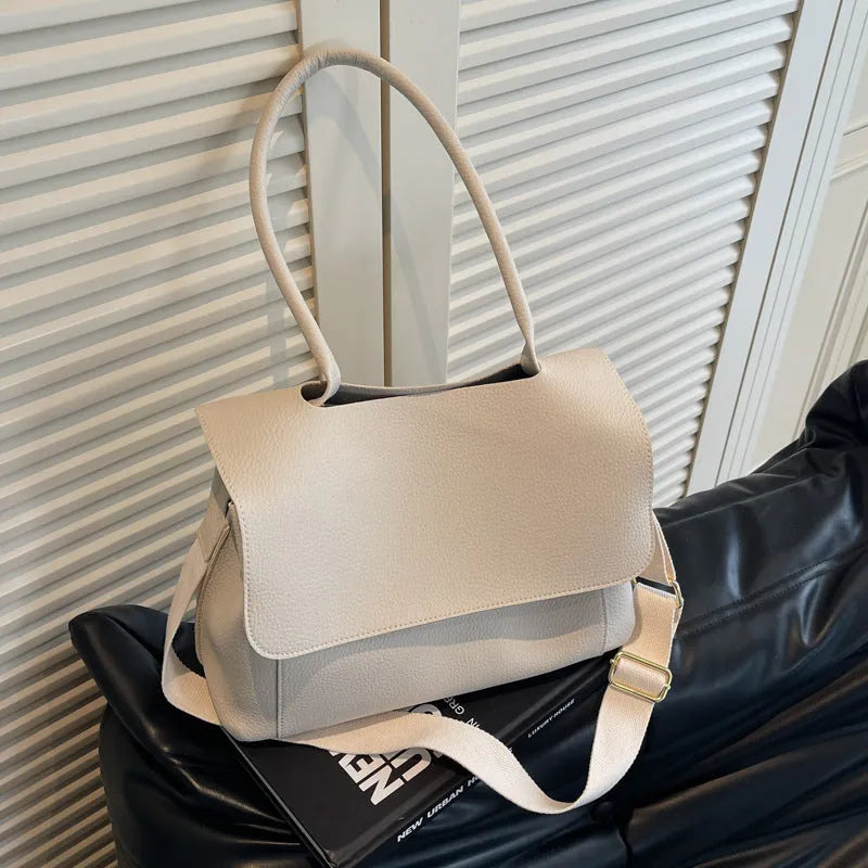 Brown PU tote bag with double shoulder straps and horizontal square shape
