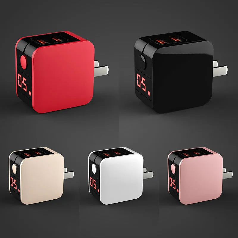 White dual USB travel wall charger with digital voltage display showing 5.0V, next to a smartphone.