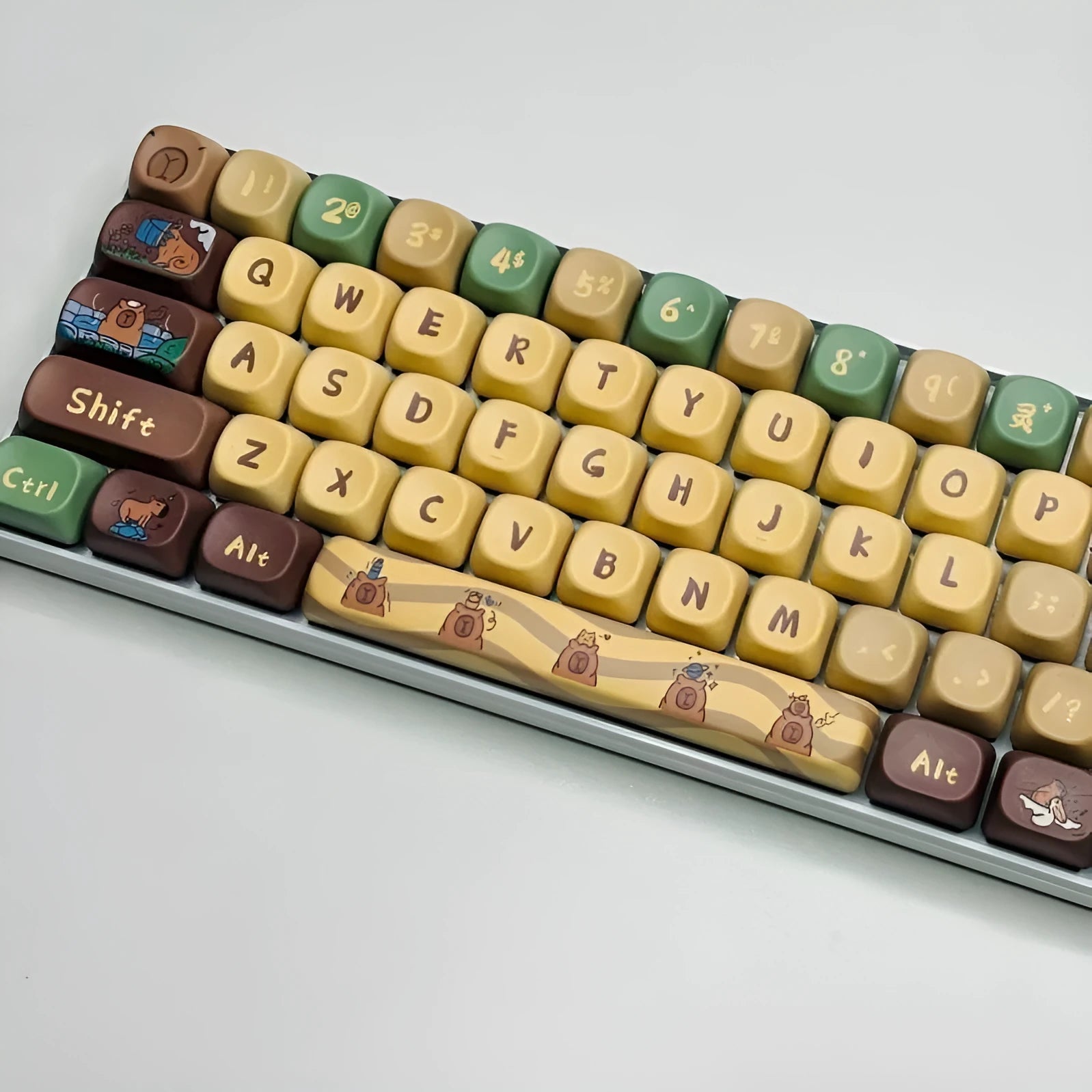 Capabala Girl MOA style 130-piece ABS plastic keycap set for mechanical keyboards, spread out showing alphanumeric and modifier keys.