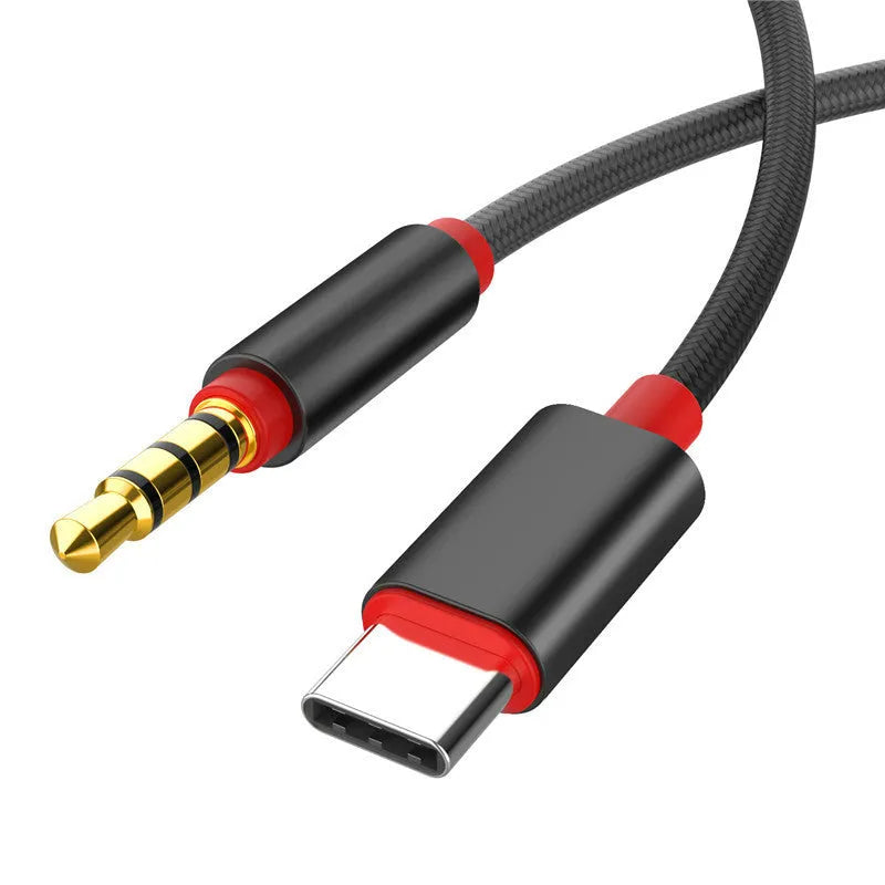 Silver and black nylon-braided audio cable for headphones and car adapters in three lengths.