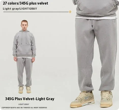 Men's solid colour cotton velvet sweatpants with ankle banding in a mid waist design