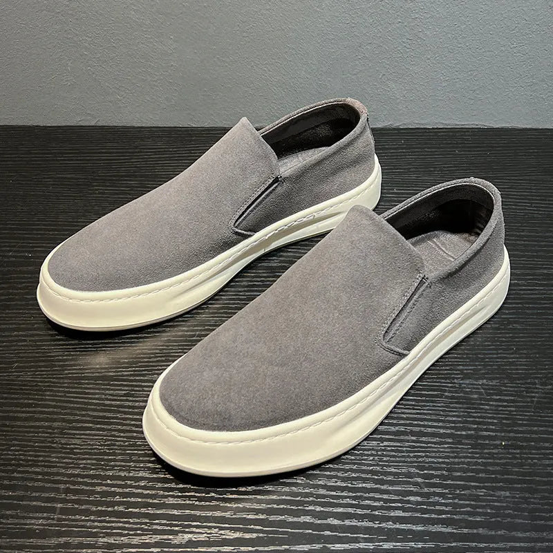 Men's apricot and grey casual slip-on shoes with round toe and rubber sole on a white background.