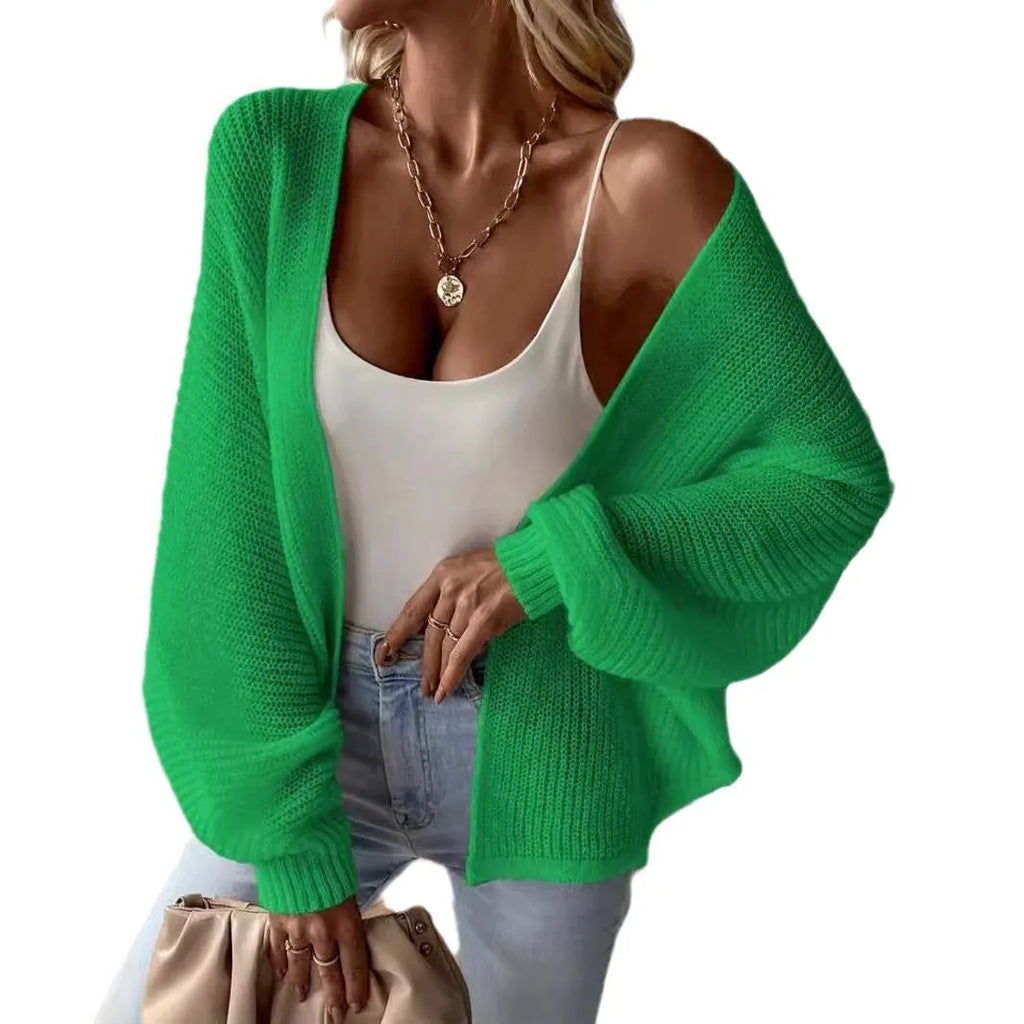 Batwing sleeve cardigan in thin polyester fabric shown in loose fit with solid colour options
