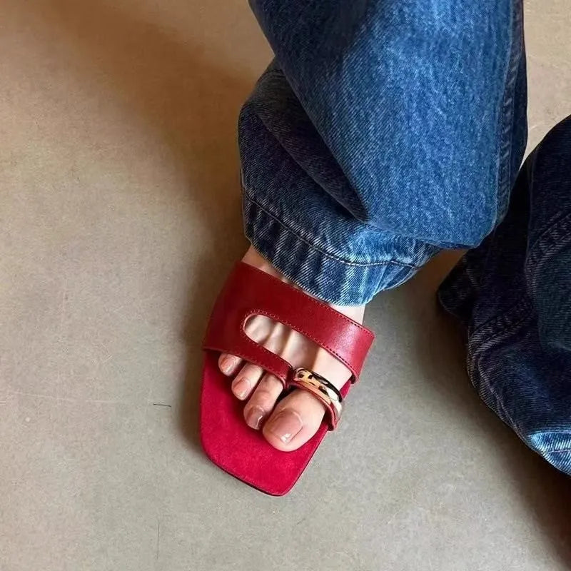 Leather outdoor slippers with rubber soles in black, white, red, and silver colours with square head design