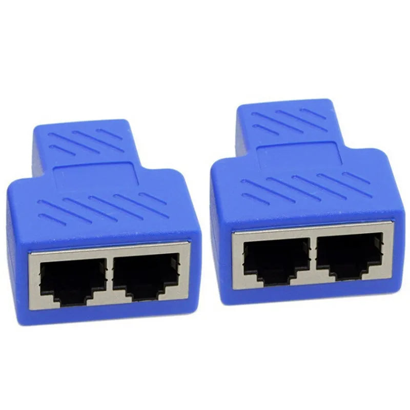 Two white RJ45 three-way tee network cable splitters on a surface