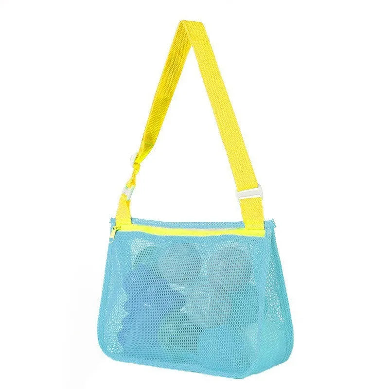 Blue nylon mesh travel storage bag with black handle and zip seal for children's clothing organisation