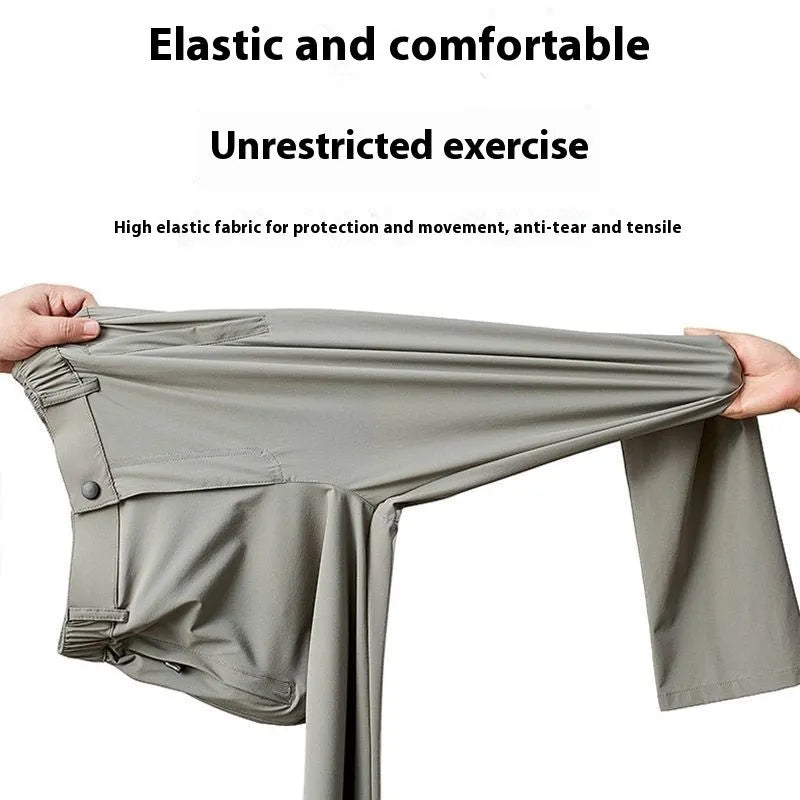 Man wearing black ice silk straight-leg loose casual trousers with an elastic waist.