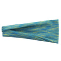 Placed flat, a plaid pattern sports headband in a neutral colour, with geometric elements at the centre