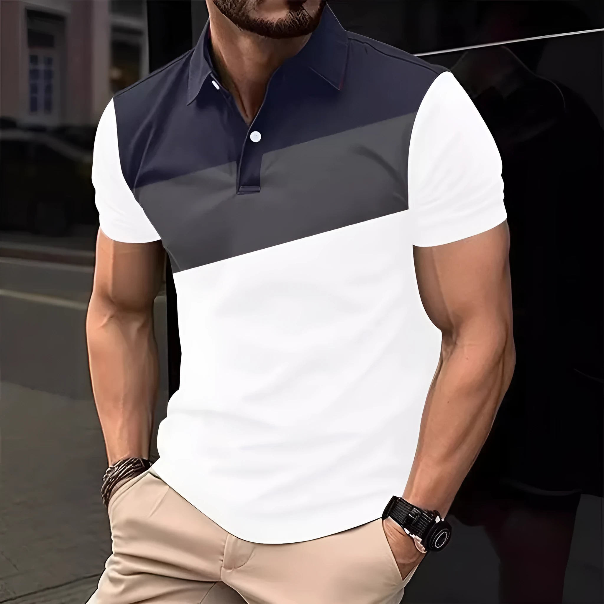 Man wearing a loose-fit grey T-shirt with a colourful 3D digital printed graphic design.