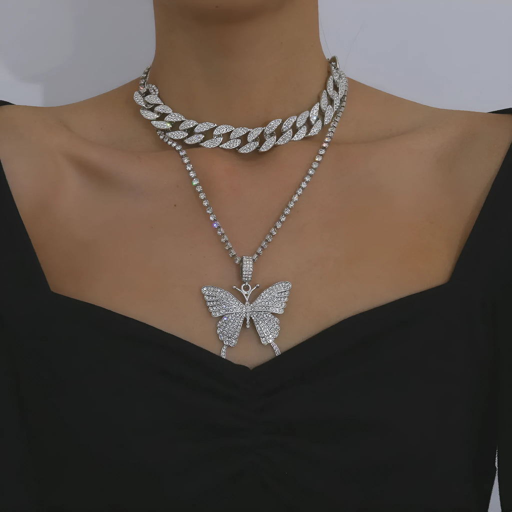 Butterfly-shaped alloy pendant necklace with rhinestone accents, gold electroplated finish