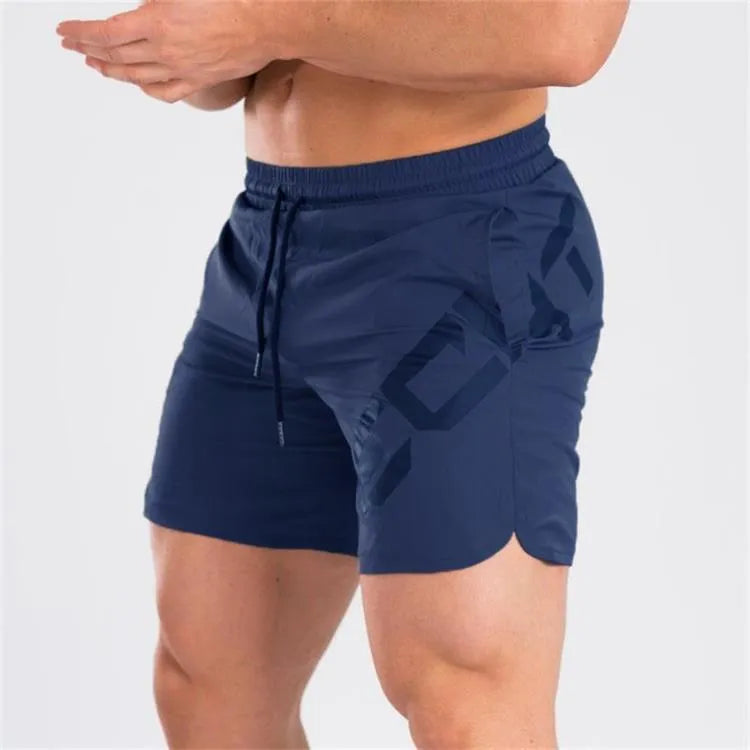 Men's elastic knee-length training shorts in quick-drying chemical blend fabric shown in black colour