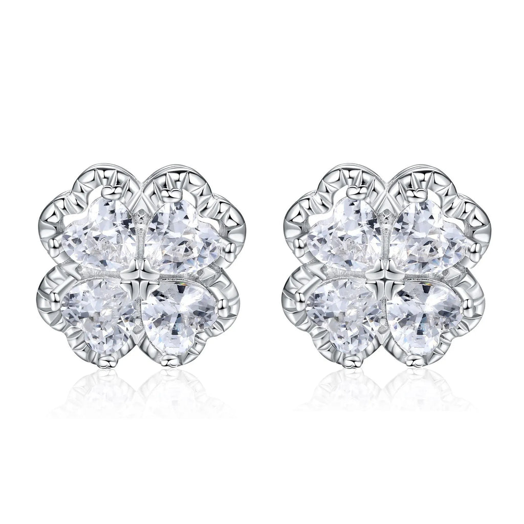 A pair of women's silver stud earrings with a four-leaf clover and heart design, white gold colour finish.
