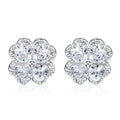 A pair of women's silver stud earrings with a four-leaf clover and heart design, white gold colour finish.