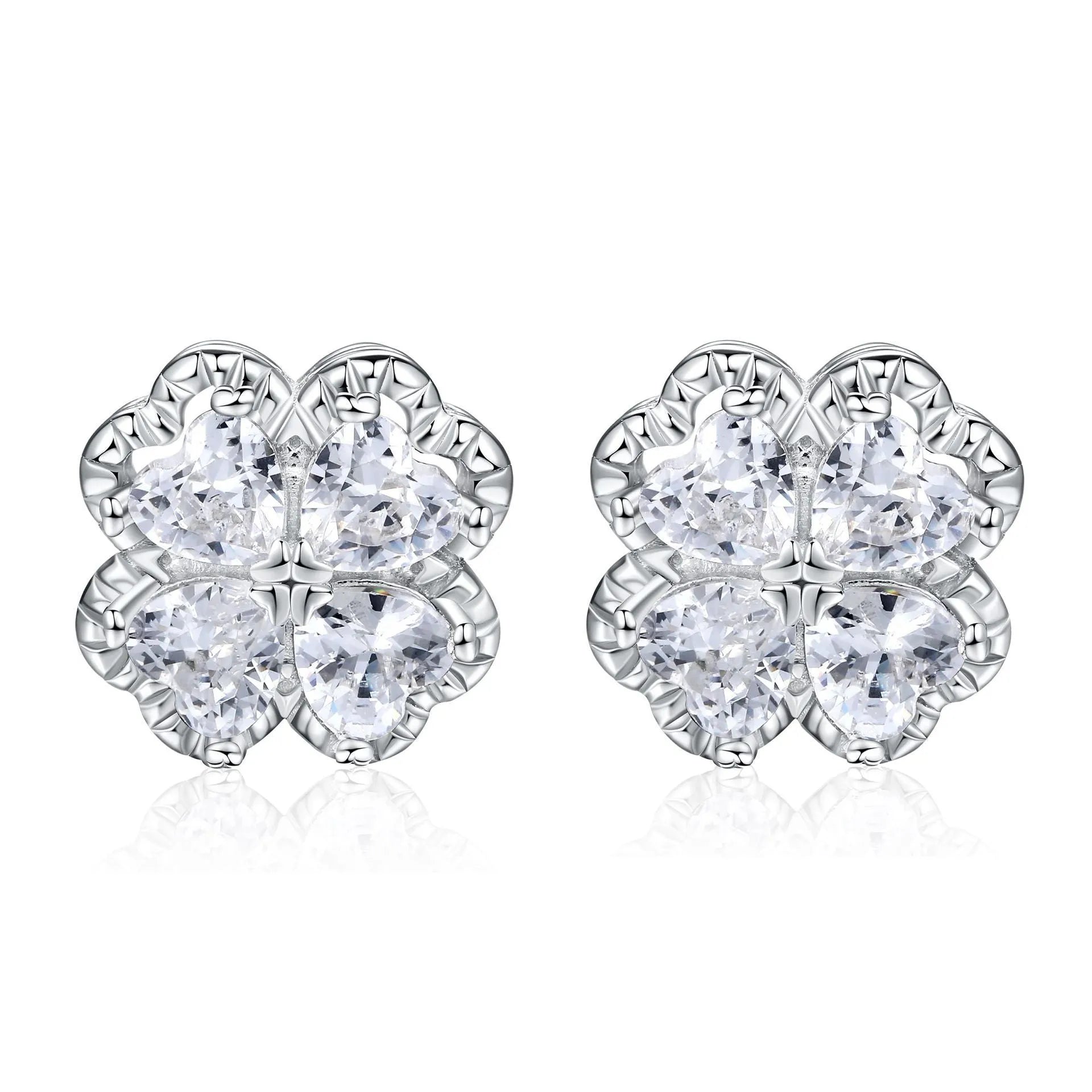 A pair of women's silver stud earrings with a four-leaf clover and heart design, white gold colour finish.