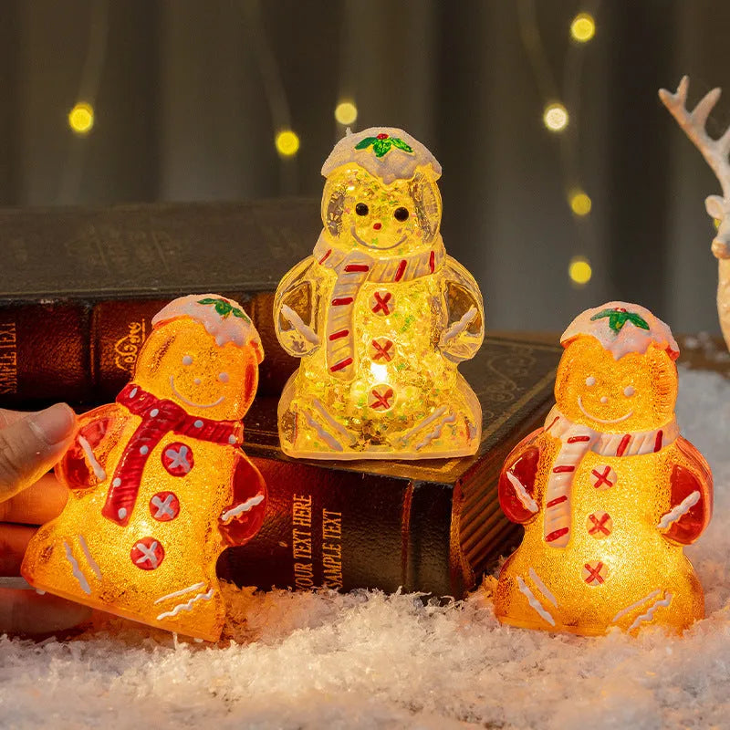 Glowing plastic gingerbread man Christmas ornament with LED light and scarf, in four colour variations.