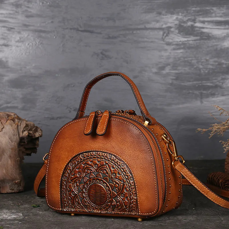 Vintage suede cowhide leather handbag with multiple interior pockets including ID and phone slots.