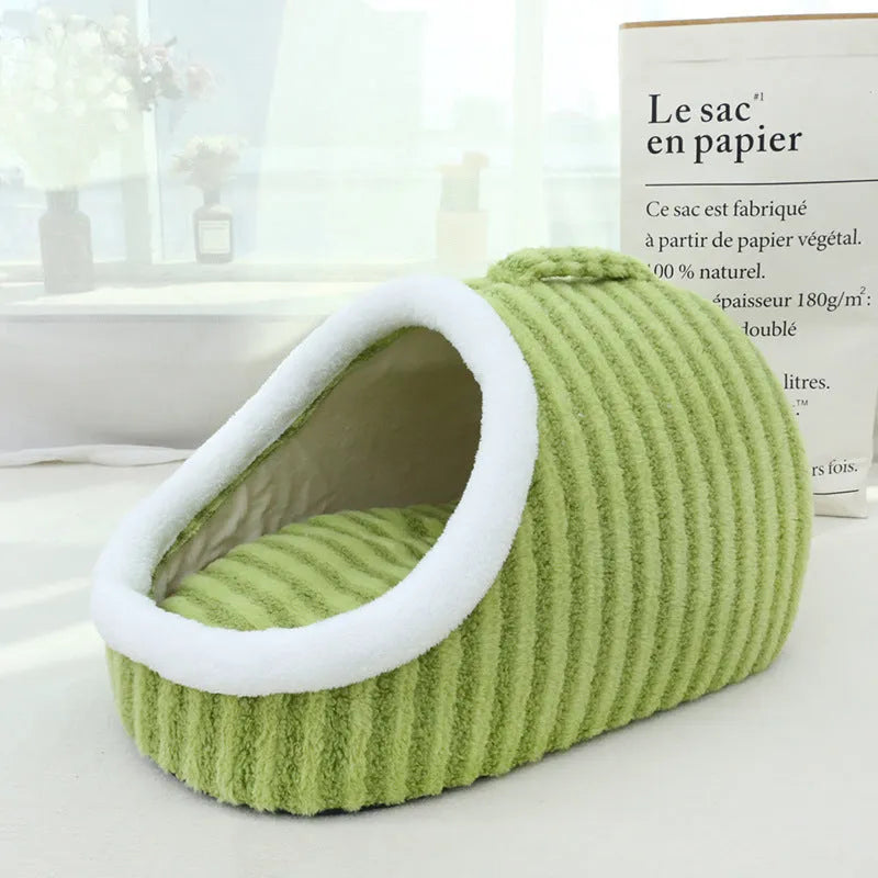 Macaron-shaped cat bed in blue colour, showing three-dimensional design with cloth material