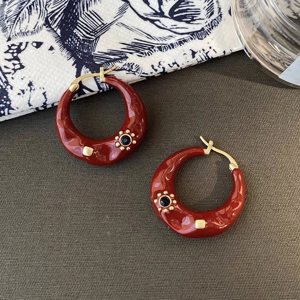 Hong Kong style retro ear studs with rhinestone inlay and dripping oil finish in black and red colours