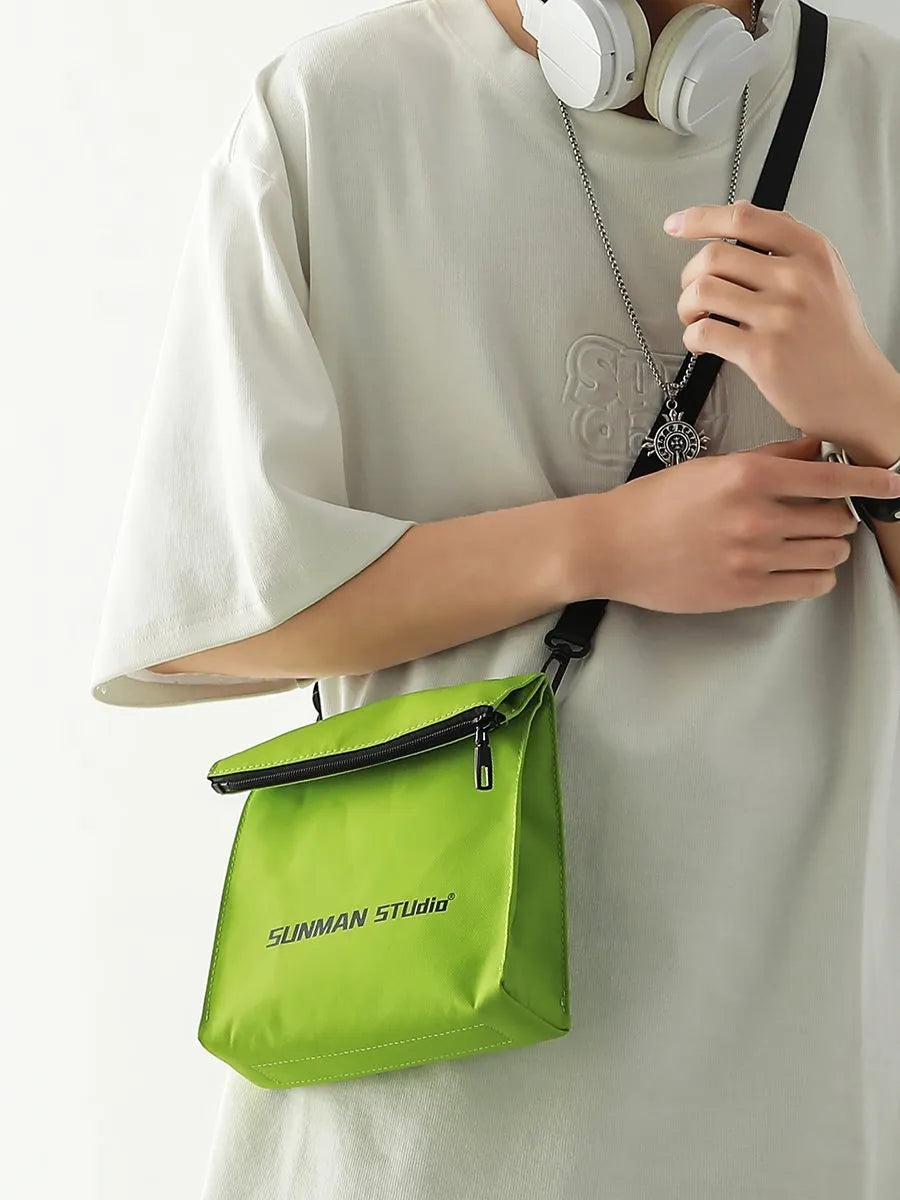 Simple all-match messenger bag backpack in polyester with adjustable crossbody strap, showing sewing line detail