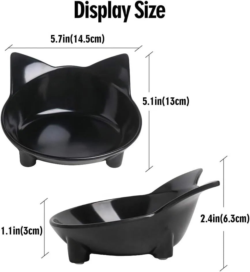 Shallow black melamine cat bowl with non-slip rubber base on a kitchen floor