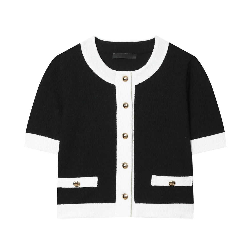 Women's two-piece casual suit with a beaded leather round neck top and high-waisted trousers.