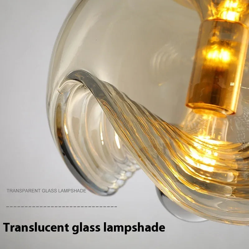 Modern minimalist glass chandelier with transparent shade, 250mm in size.