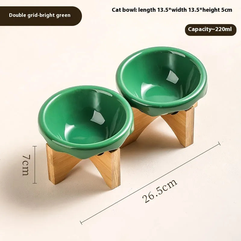 Porcelain cat drinking water bowl in bright red single grid configuration on surface