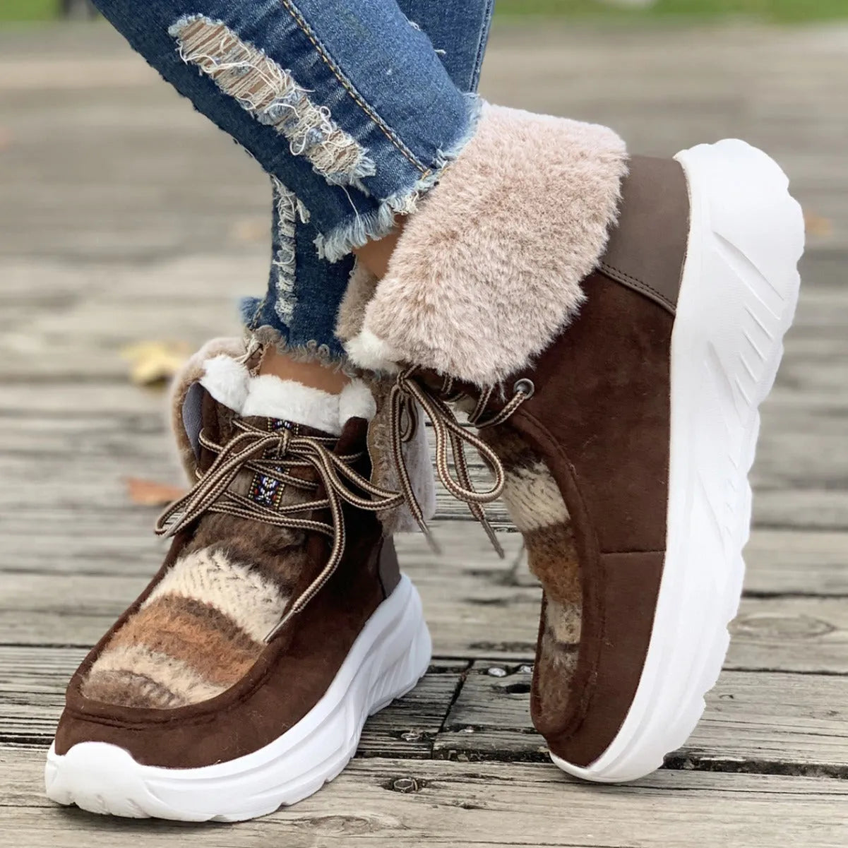 Women's beige lace-up snow boots with fuzzy lining and thick platform soles
