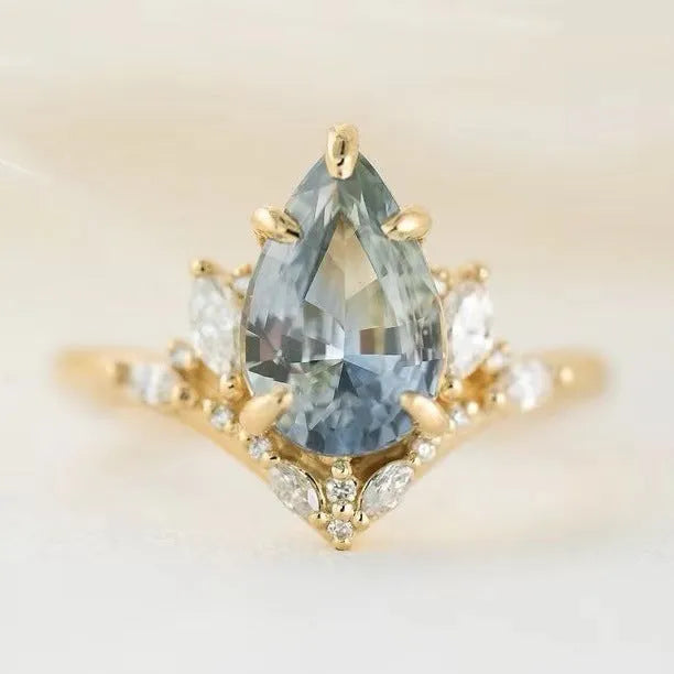 Gold-tone alloy floral ring with blue aquamarine-coloured crystal and diamond inlay for women