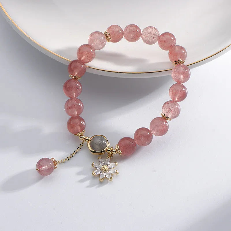 Natural strawberry quartz Mori-style bracelet with floral details on electroplated metal