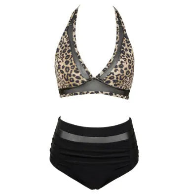 Women's black polyester bikini set with halter neck top and briefs on a mannequin.