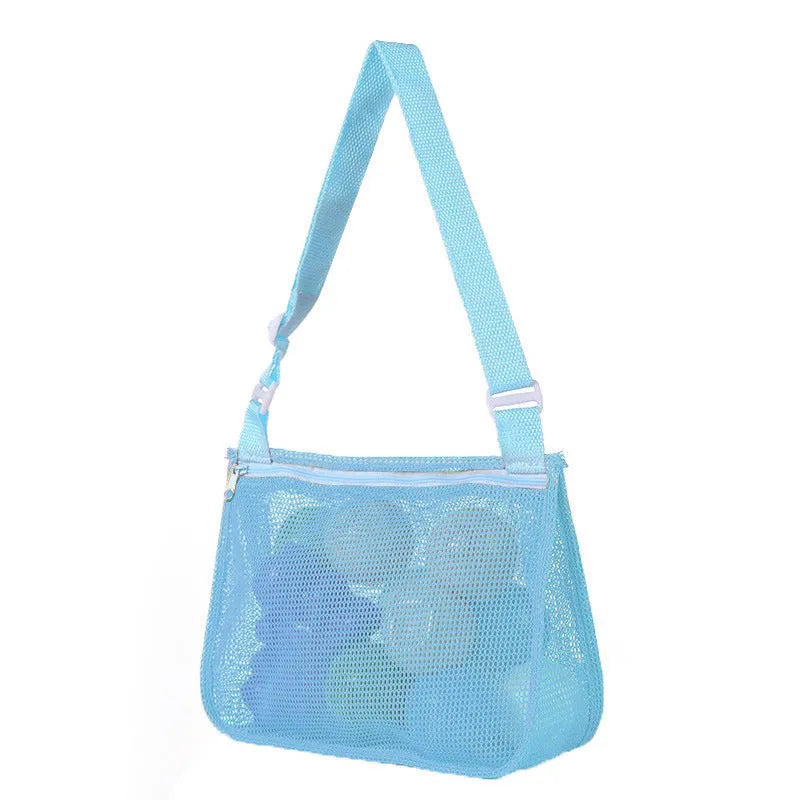 Blue nylon mesh travel storage bag with black handle and zip seal for children's clothing organisation