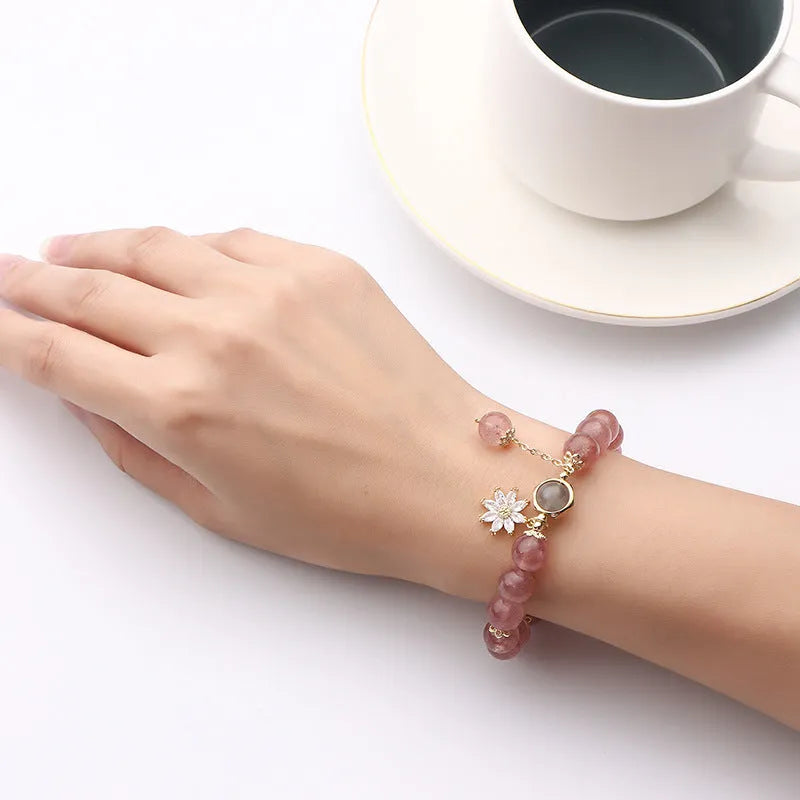 Natural strawberry quartz Mori-style bracelet with floral details on electroplated metal