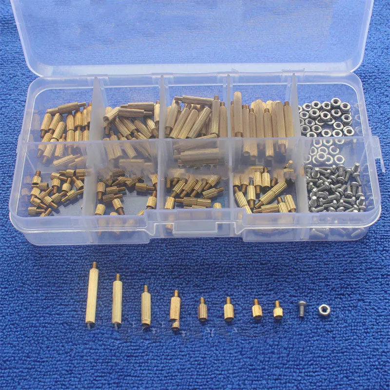 Gold-coloured 260-piece stainless steel screw nut and brass copper column set stored in a clear compartment box