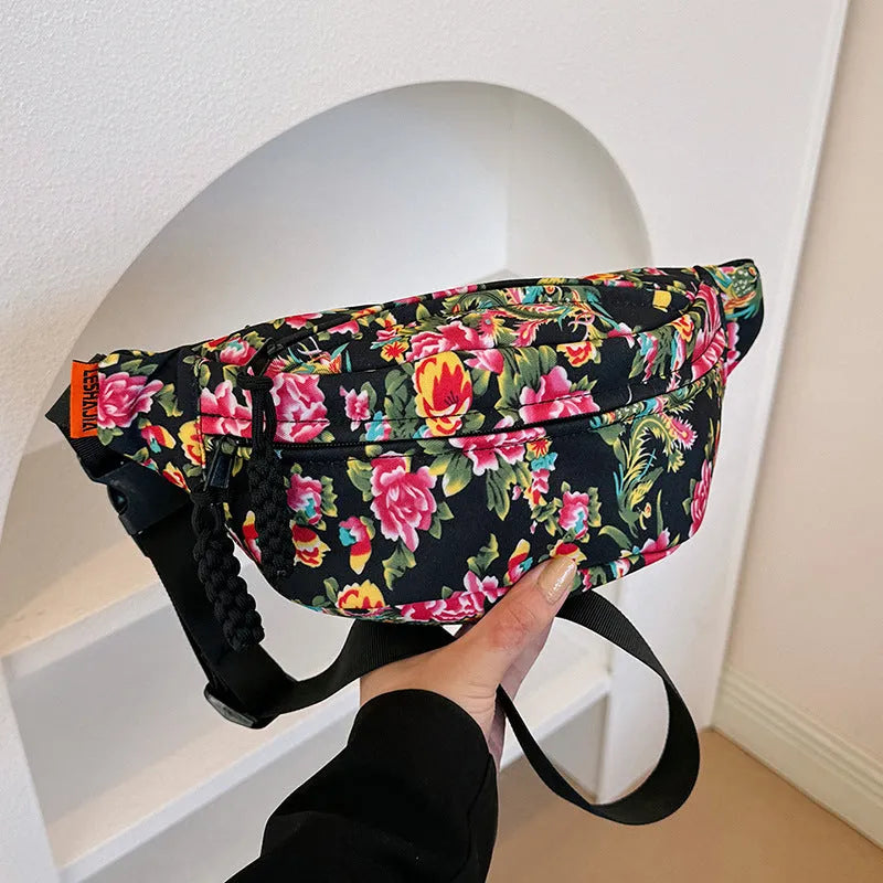 Western style women's waist bag with large flower design and contrast stitching in nylon