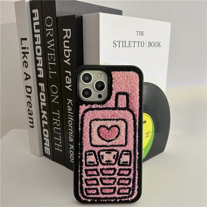 Pink TPU iPhone back cover case with a textured towel embroidered design.