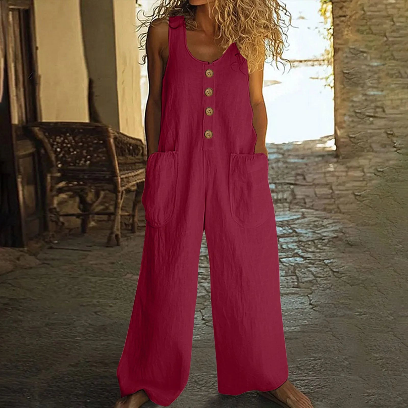 Sleeveless wide leg cotton jumpsuit in peacock green colour with pockets and elasticated waist
